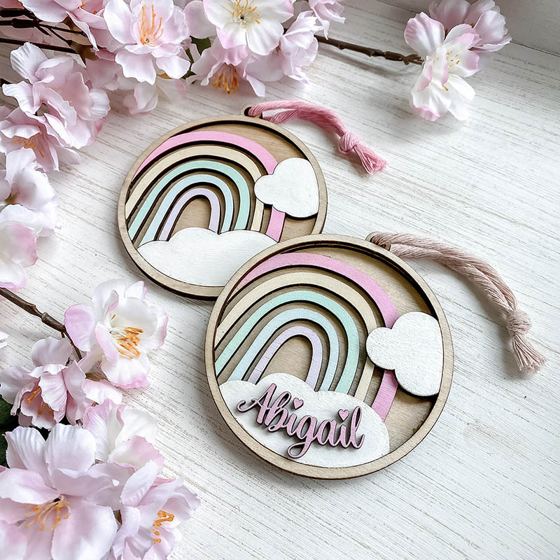茄子视频 laser cut wooden ornaments with rainbows and colorful names